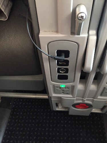USB, headphone jack and power outlet under the armrest