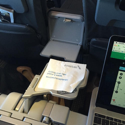 Tray table with my laptop and the cocktail tray