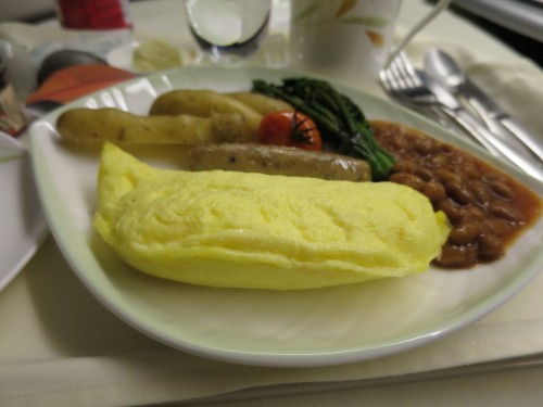 Omelette, beans, potatoes, sausage — pretty standard Western option