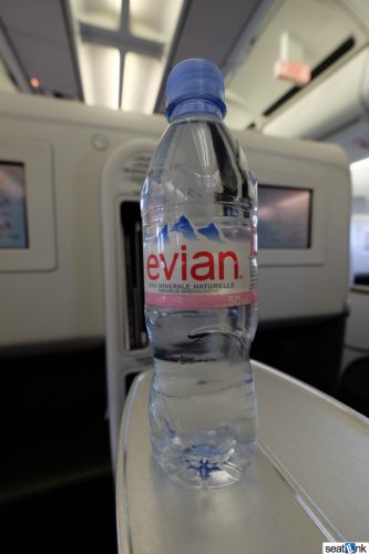 Evian bottled water given at boarding
