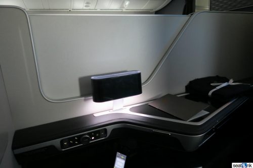 The partition between the middle seats in BA first class