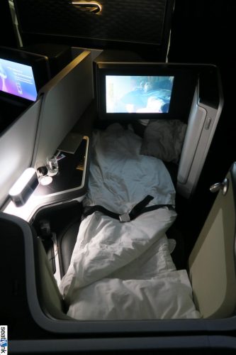 Another view of the first class seat in bed mode