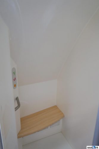 There’s even a seat in the first class shower!