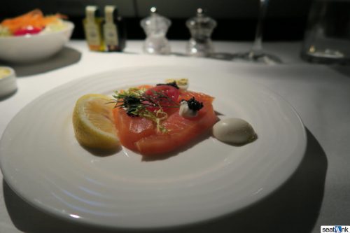 Mid-flight snack of smoked salmon with caviar on Emirates