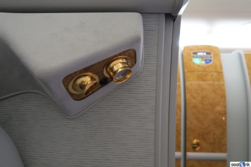 Integrated reading light and air vent