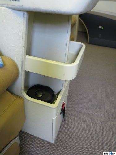 Additional storage for headphones and such