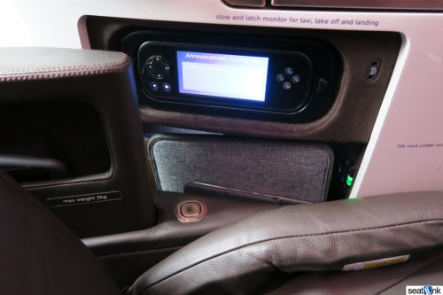 Ever-important computer stowage below the IFE controls