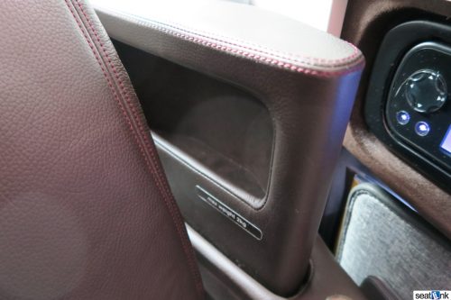Stowage for phones etc in the armrest