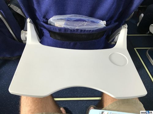 Small but effective traytable…with a strange cutout?