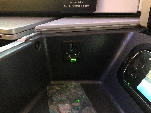 Universal outlet in the side bin