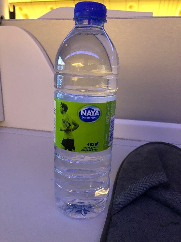 Bottle of Naya water at the seat